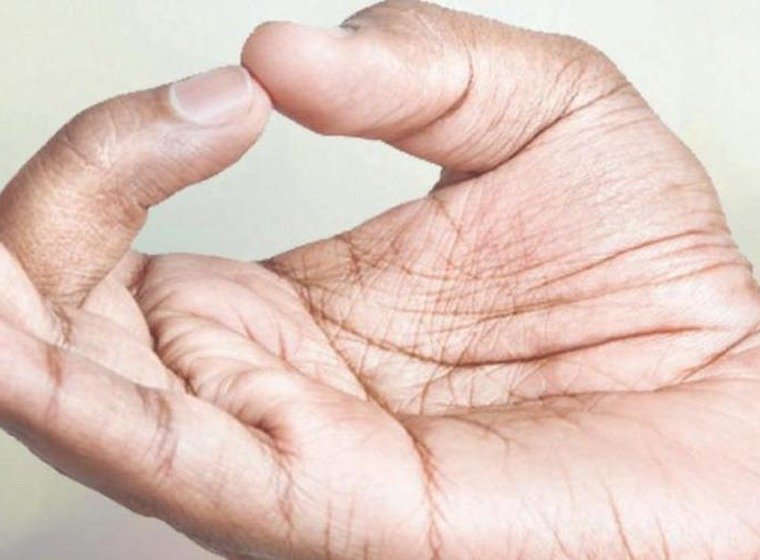 Aakash Mudra hand gesture with middle finger and thumb touching