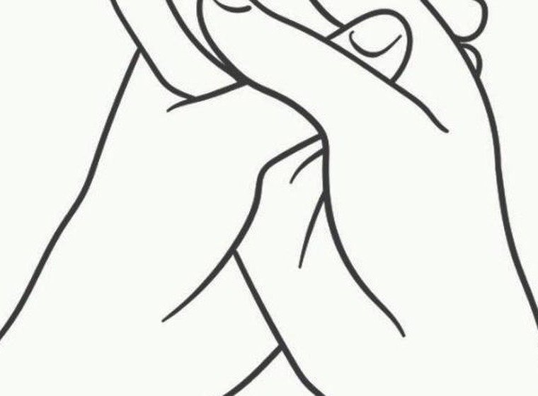 Naga Mudra hand gesture with fingers interlocked and thumbs crossed